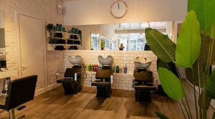 David Masters Salon - Richmond Bridge, features sleek styling chairs and modern wash stations in Twickenham, England, GB.