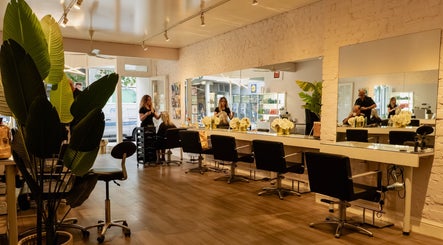 Modern salon interior at David Masters Salon - Richmond Bridge, Twickenham, England, GB, with stylish decor.