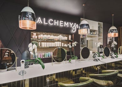 Chic interior of Alchemy Berkhamsted with mirrors and lighting in Berkhamsted, England, GB.