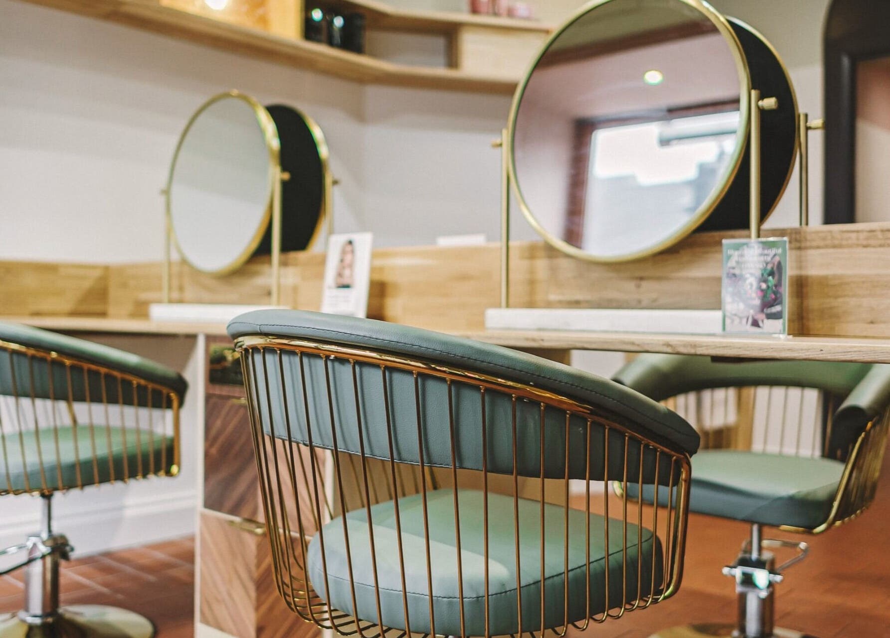 Modern salon seats at Alchemy & I, Berkhamsted, England, GB, showcasing elegant style and comfort.