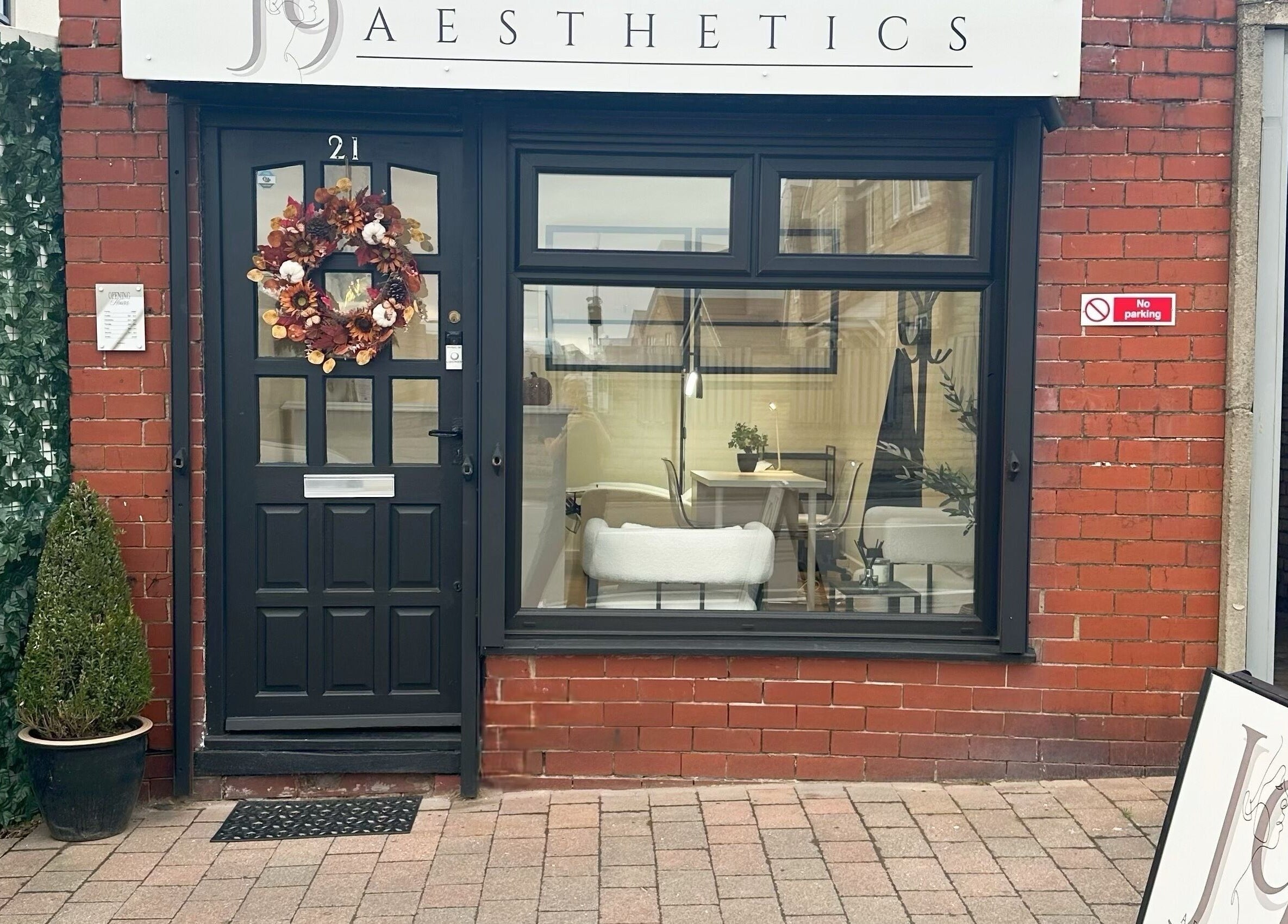 Entrance of J9 Aesthetics in Harworth, England, GB, showcasing inviting decor and signage.