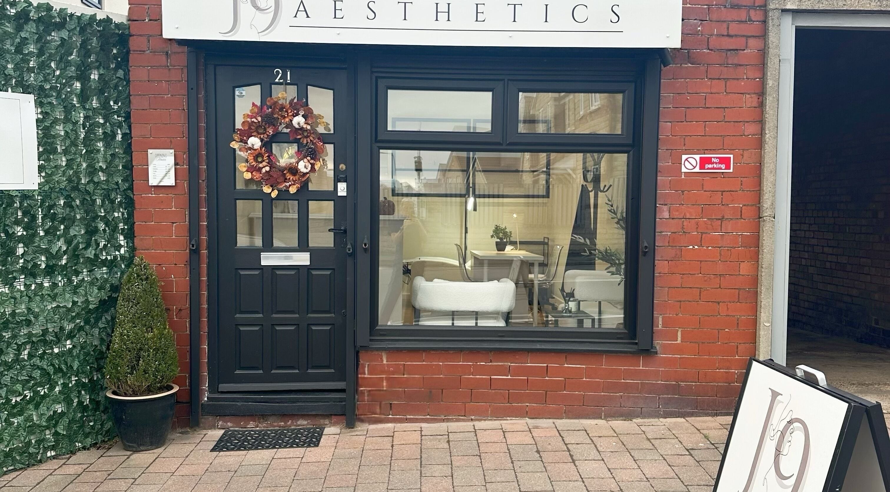 Entrance of J9 Aesthetics in Harworth, England, GB, showcasing inviting decor and signage.
