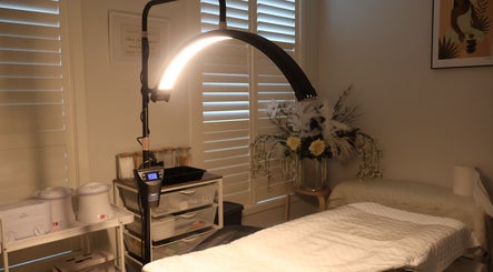 Relaxing treatment room at The Comfort Room, Campbelltown, New South Wales, AU with ambient lighting.