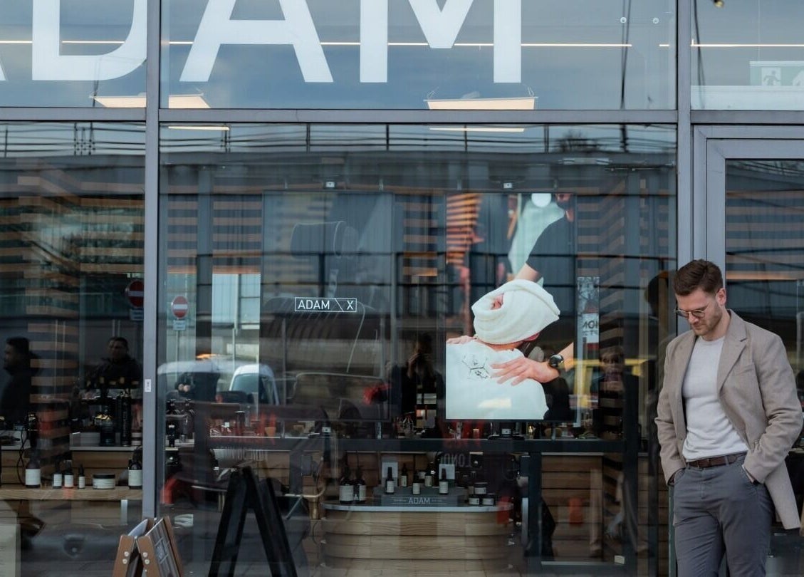 Front view of ADAM Grooming Atelier - Westfield London showcasing elegant design. London, England, GB.