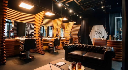 Modern, stylish barber lounge at ADAM Grooming Atelier - Mayfair St Christopher's Place, London, England, GB.