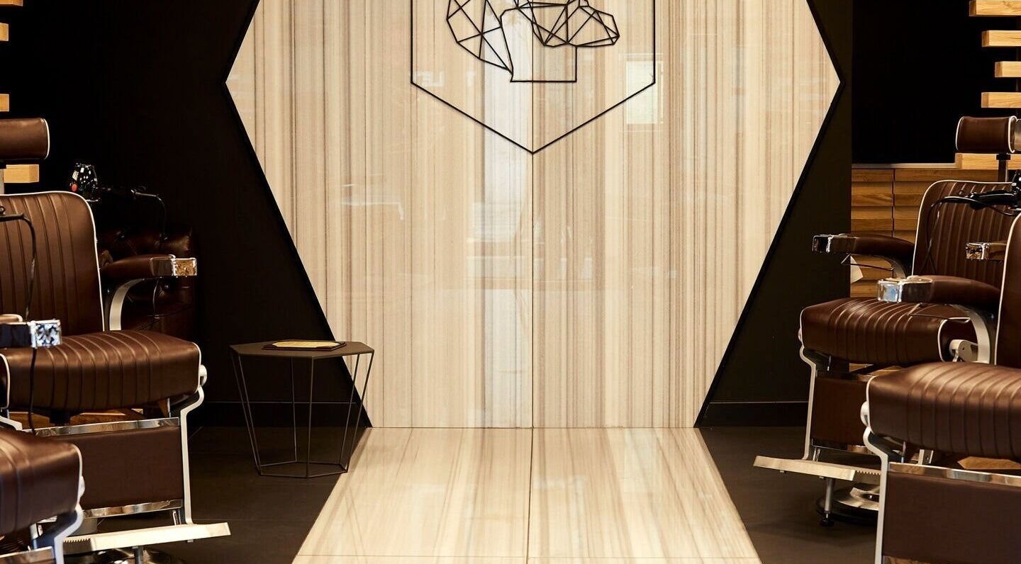 Luxury barber chairs at ADAM Grooming Atelier - Liverpool Street, London, England, GB.