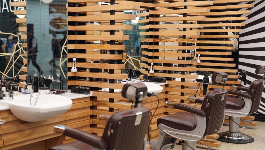 Stylish interior of ADAM Grooming Atelier - Canary Wharf Mall Jubilee Place, London, England, GB.