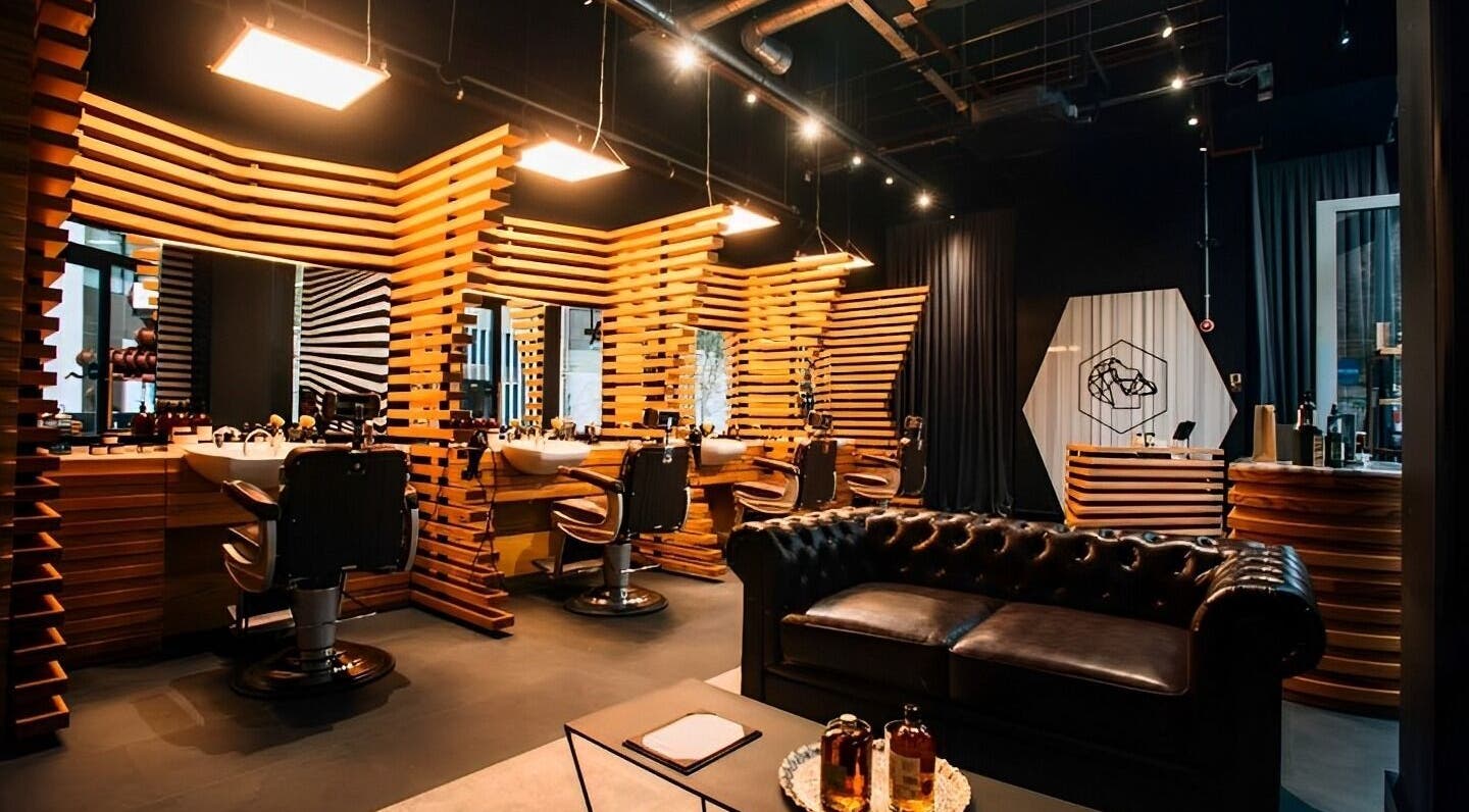 Stylish interior of ADAM Grooming Atelier - Mayfair St Christopher's Place, London, England, GB.