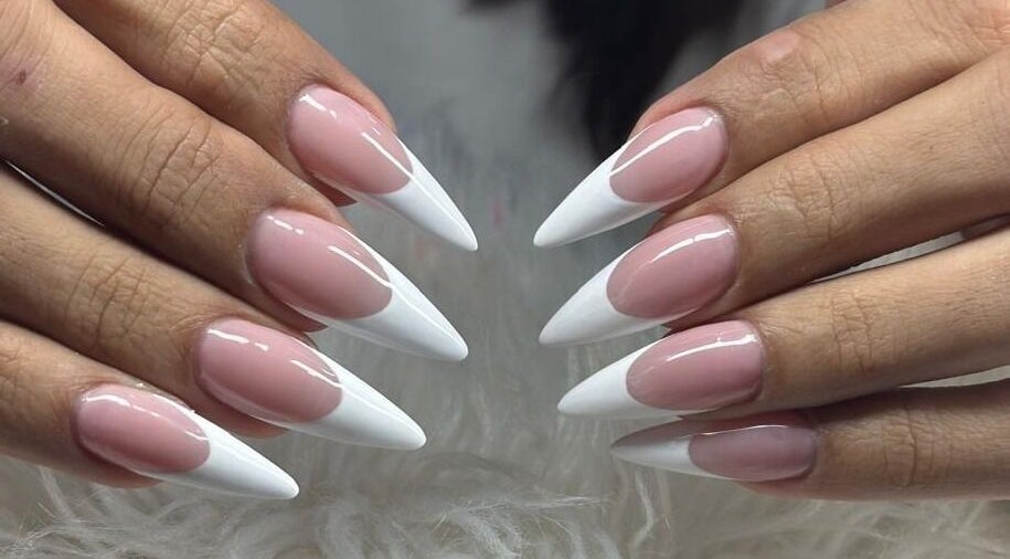 Elegant French manicure at Hair Beauty. YR, Port of Spain, Port of Spain Corporation, TT for stylish nails.