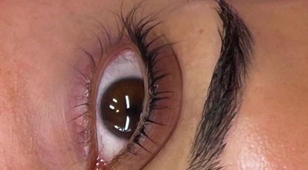 Close-up of eye highlighting lash enhancement at Faces Enhanced, Nottingham, England, GB.
