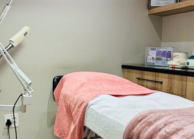 Relaxing spa treatment room at Beauty By Kelly, Boksburg, Gauteng, ZA with cozy bed and equipment.