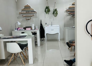 Modern nail service area at Beauty By Kelly, Boksburg, Gauteng, ZA, featuring stylish decor and seating.