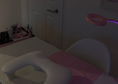 Cozy nail station at Certified Lover Nails in Mitcham, England, GB, featuring a sleek manicure setup.