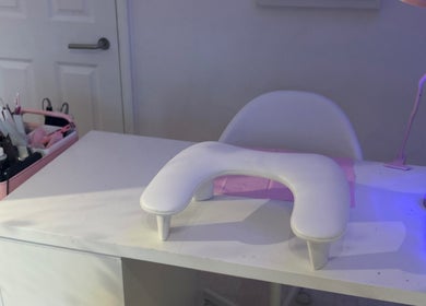 Manicure station at Certified Lover Nails, Mitcham, England, GB, featuring tools and an inviting ambiance.