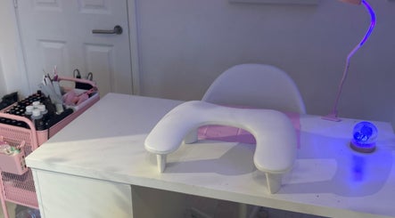 Manicure station at Certified Lover Nails, Mitcham, England, GB, featuring tools and an inviting ambiance.