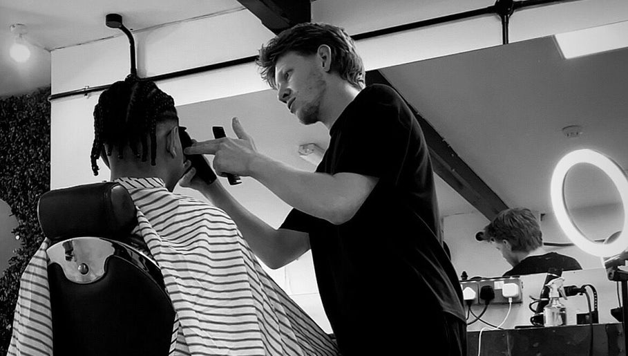 Barber styling at Slick Society, Chester, England, GB in modern setting.