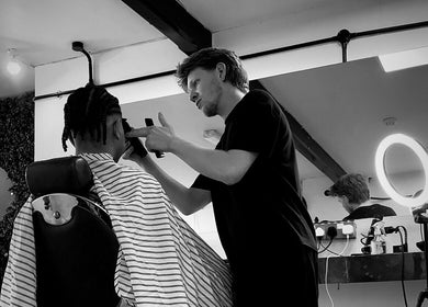Barber styling at Slick Society, Chester, England, GB in modern setting.