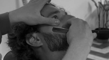 Close-up of professional shave at Slick Society, Chester, England, GB, showcasing expert grooming techniques.
