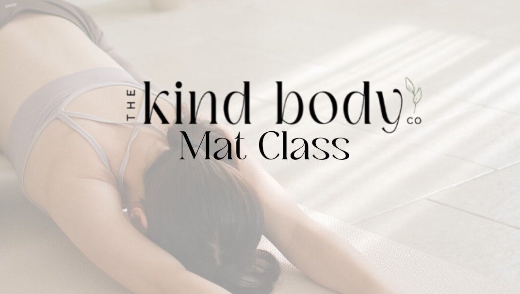 Woman in Pilates Mat Class at Sturgeon Bay, Wisconsin, US, stretching gracefully on mat.