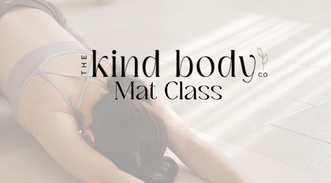 Woman in Pilates Mat Class at Sturgeon Bay, Wisconsin, US, stretching gracefully on mat.