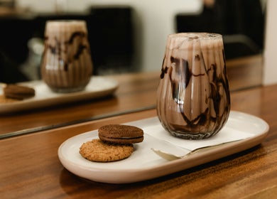 Indulge at Paragon Hair with gourmet drink and cookies, Belgian Gardens, Queensland, AU.