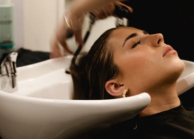 Relaxing hair wash at Paragon Hair, Belgian Gardens, Queensland, AU. Experience luxury and care.