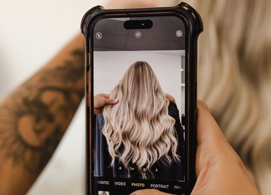 Blonde wavy hair photo at Paragon Hair, Belgian Gardens, Queensland, AU.