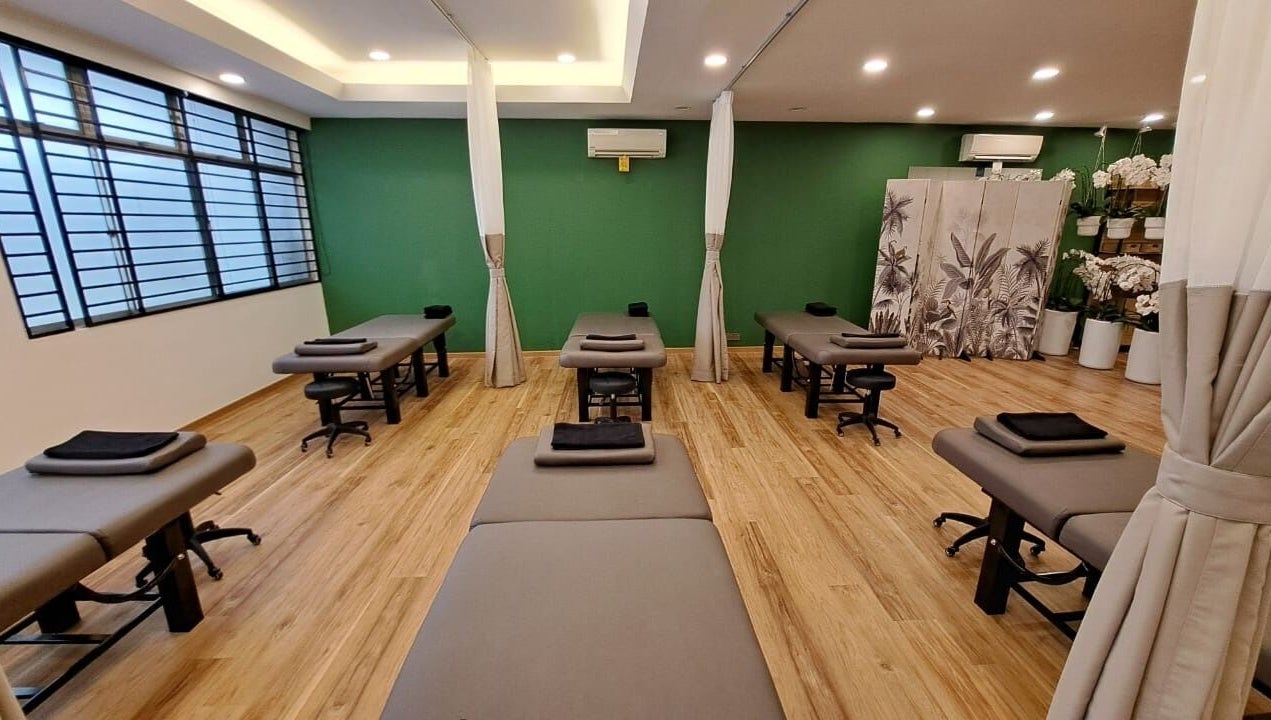 Spacious therapy room at The Flexologist, Kuala Lumpur, Wilayah Persekutuan Kuala Lumpur, MY with massage tables.