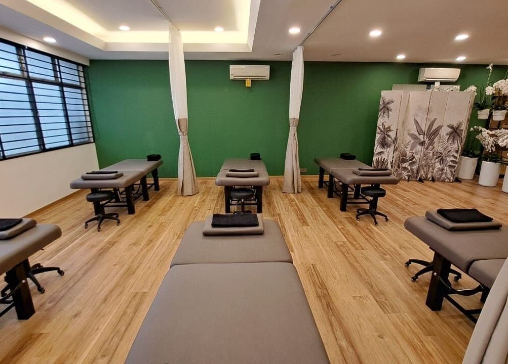 Spacious therapy room at The Flexologist, Kuala Lumpur, Wilayah Persekutuan Kuala Lumpur, MY with massage tables.