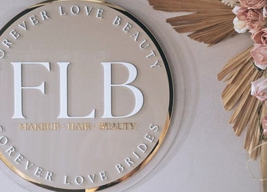 FOREVER LOVE BRIDES logo with floral design in Pimlico, Queensland, AU showcasing beauty and elegance.