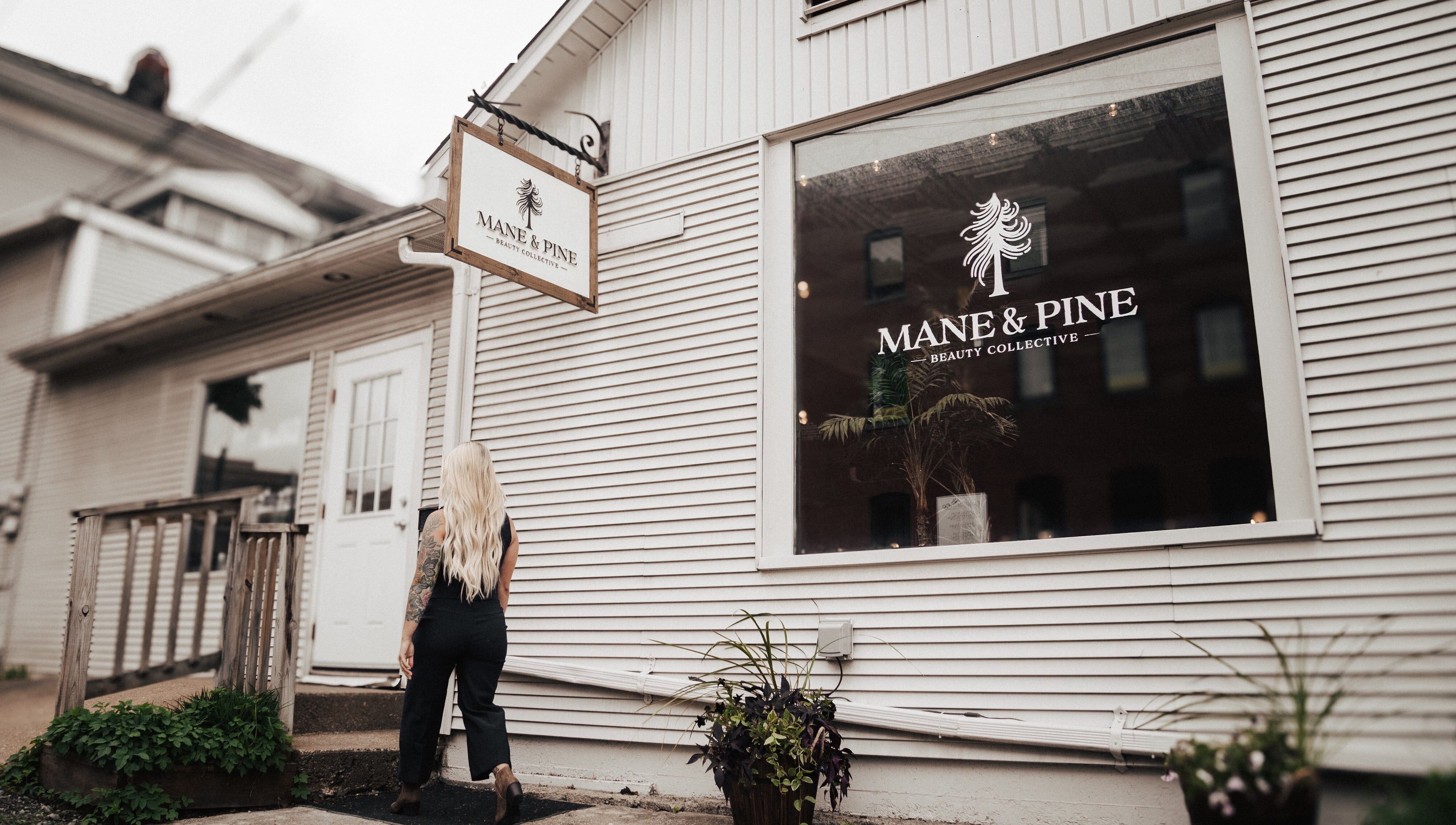Mane & Pine (Laurie Gurr Beauty) entrance in East Aurora, New York, US, showcasing its elegant storefront.