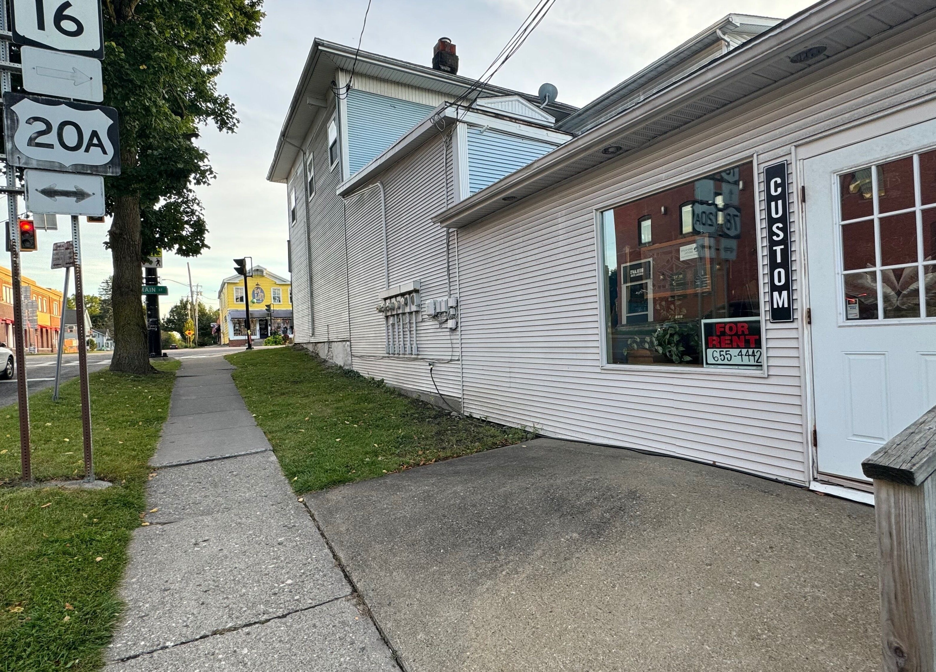 Street view near Mane & Pine (Laurie Gurr Beauty) in East Aurora, New York, US, showcasing local shops.
