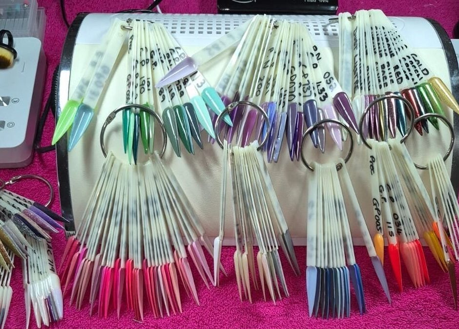 Diverse nail color palette at Eksie Perfeksie Naels, Gqeberha, Eastern Cape, ZA. Vibrant options for nail art.
