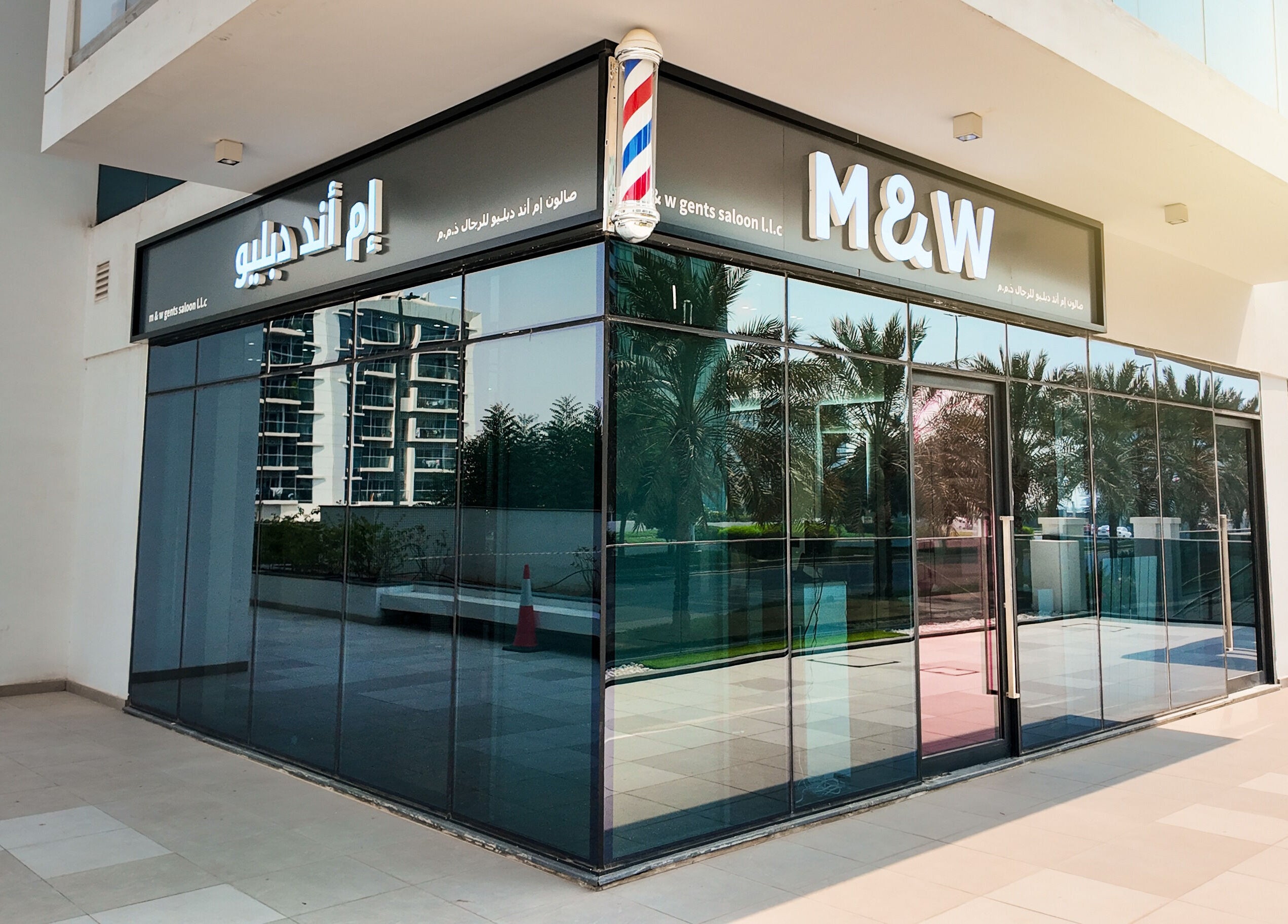 Exterior view of M&W Gents Salon, showcasing sleek design in Abu Dhabi, Abu Dhabi, AE.