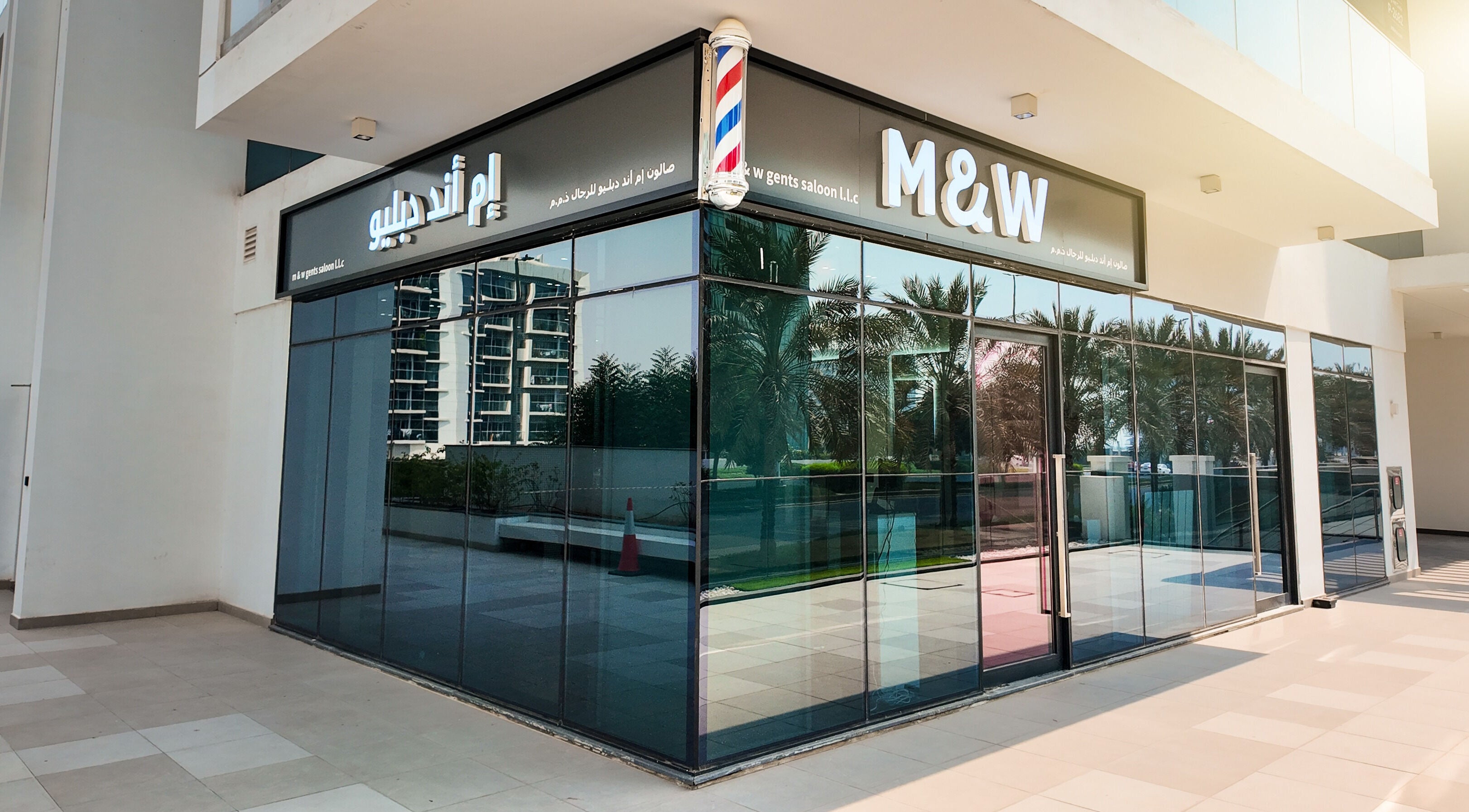 Exterior view of M&W Gents Salon, showcasing sleek design in Abu Dhabi, Abu Dhabi, AE.