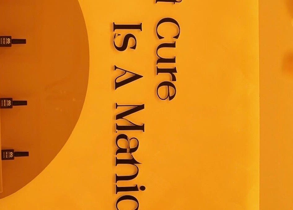 Stylish wall text 'Cure Is A Manicure' at BK NAILS, Abuja, Federal Capital Territory, NG.