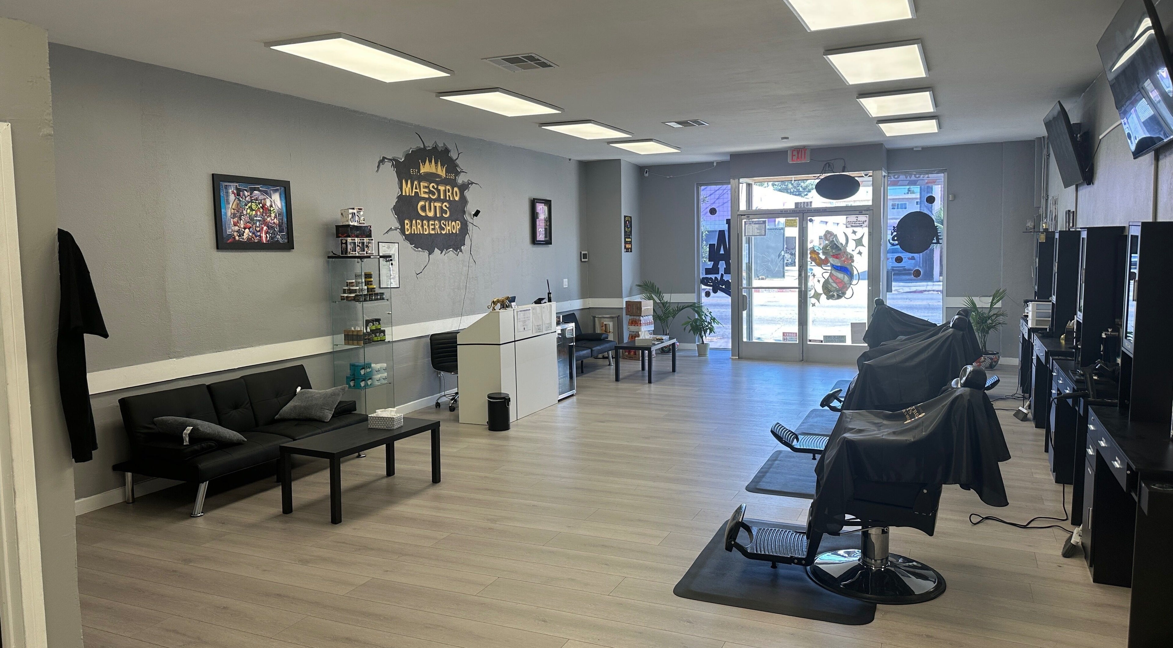 Interior of Maestro Cuts Barbershop in Van Nuys, California, US, featuring stylish chairs and modern decor.