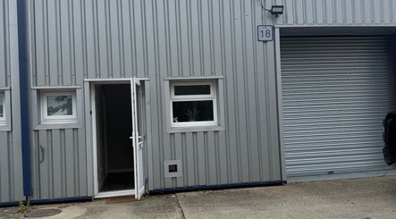 BayCo Beauty entrance in Faringdon, England, GB, featuring a sleek modern facade with an open door.