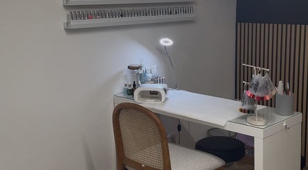 Sleek nail station at Bay Co Beauty, Faringdon, England, GB, featuring modern manicure tools.