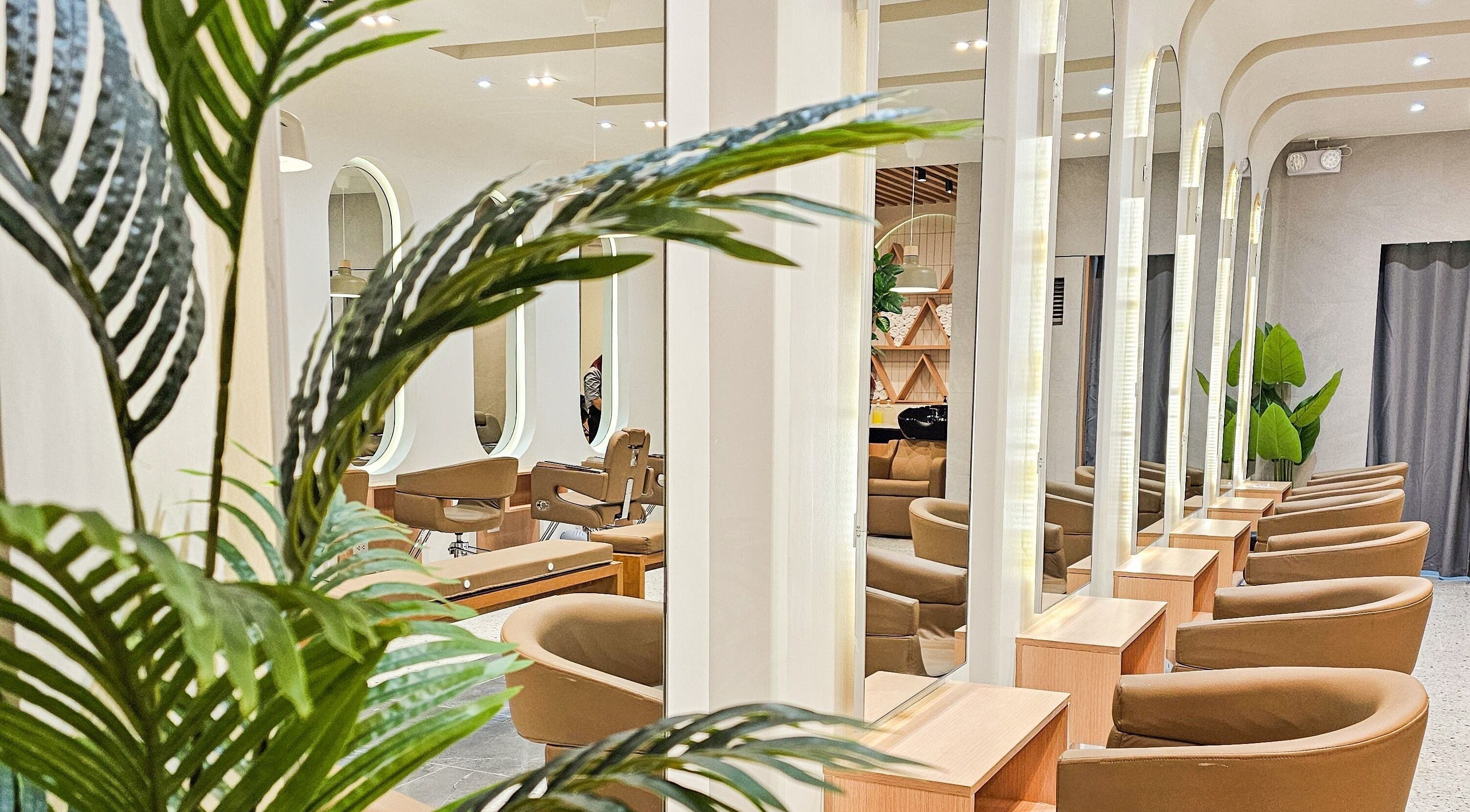 Sleek interior of Azta Urban Salon in Makati, Metro Manila, PH with modern design and comfortable seating.