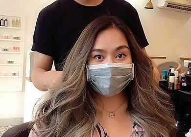 Stylist at The Beauty Salon By Andy creates stylish hair look in Hồ Chí Minh, Phường Bến Thành, VN.