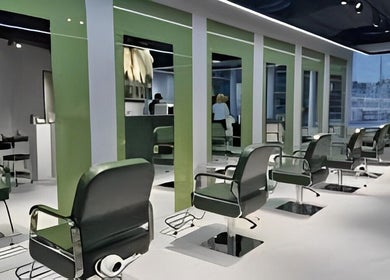 Elegant salon interior with green chairs at The Beauty Salon By Andy, Hồ Chí Minh, Phường Bến Thành, VN.