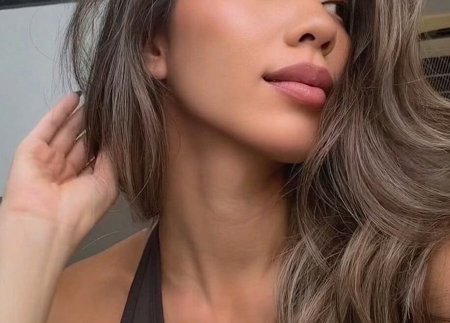 Woman with sleek hairstyle at The Beauty Salon By Andy, Hồ Chí Minh, Hồ Chí Minh, VN.