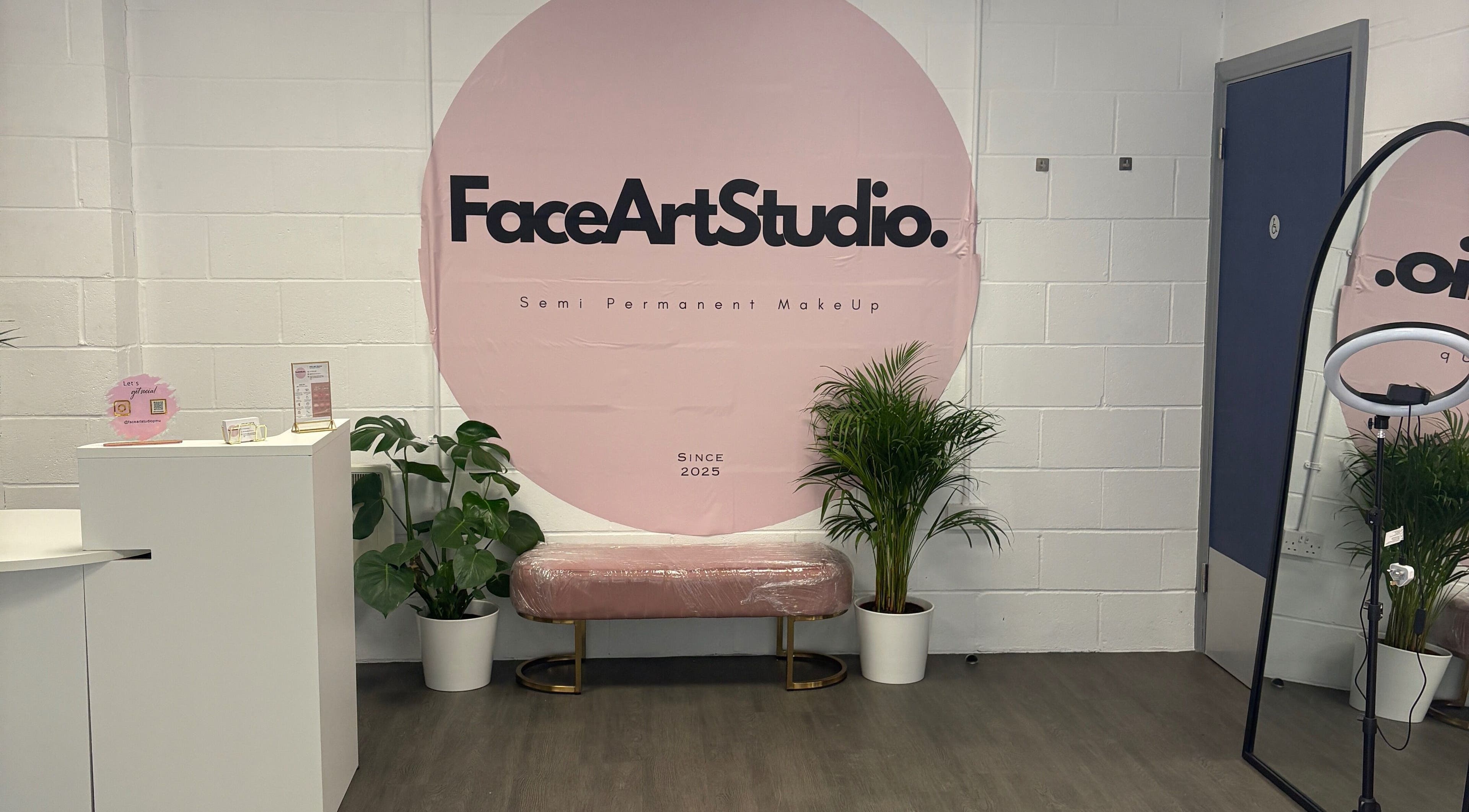 Modern interior of Face Art Studio in Hersden, England, GB, featuring a stylish pink decor and welcoming ambience.