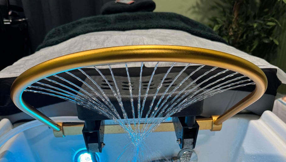 Luxurious spa treatment setup at The Zen Den Ltd., Roseau, Saint George Parish, DM, with cascading water jets.