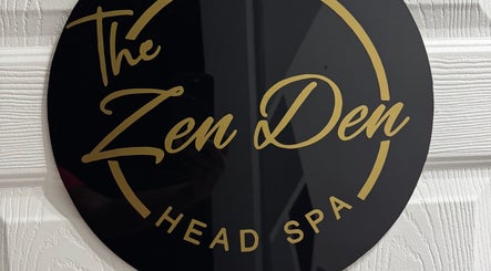 Elegant black and gold logo of The Zen Den Ltd. in Roseau, Saint George Parish, DM.