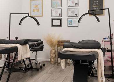 Luxurious spa chairs and decor at Eye Candy Lash and Brow Bar in Sarasota, Florida, US.