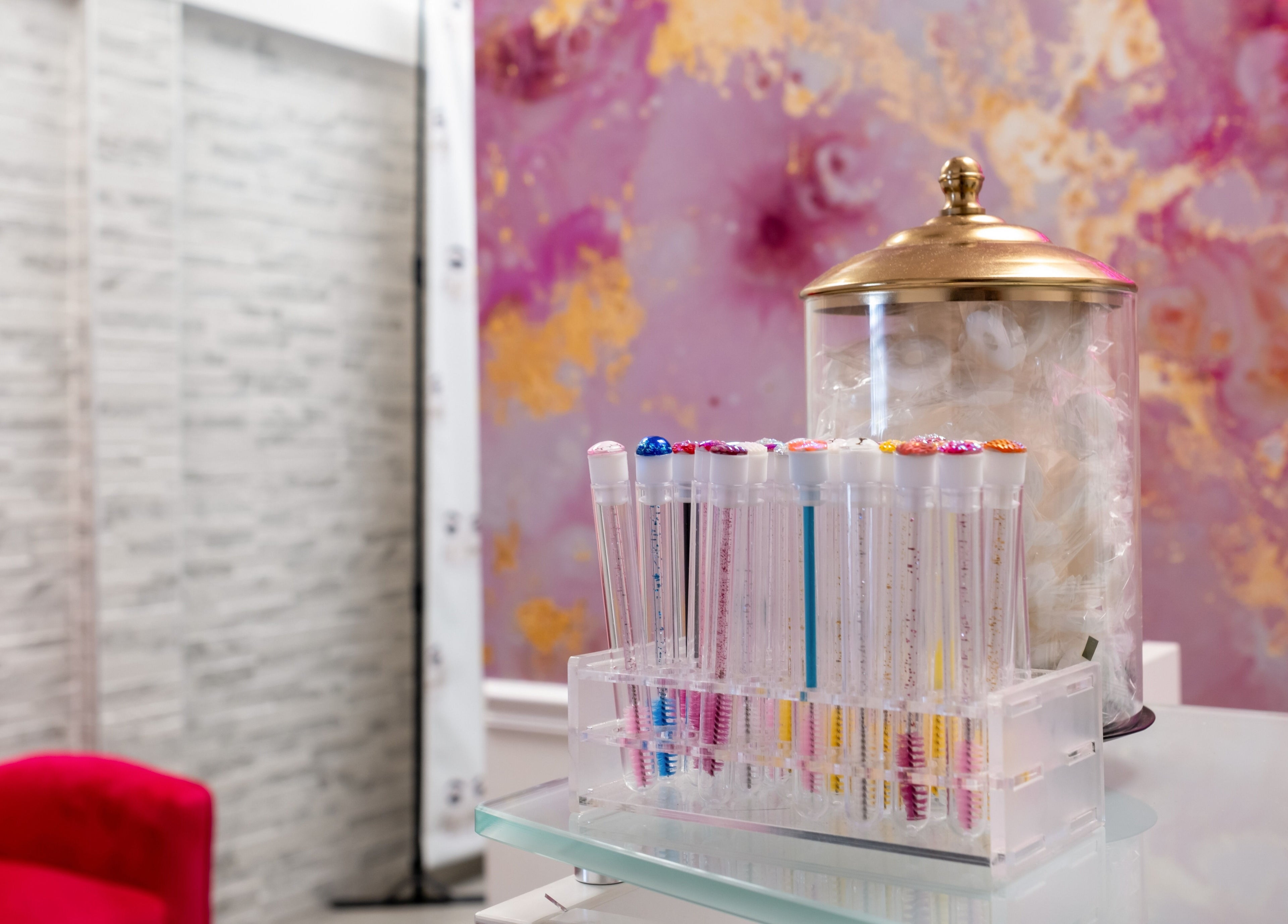 Eye Candy Lash and Brow Bar's chic interior decor and tools in Sarasota, Florida, US.