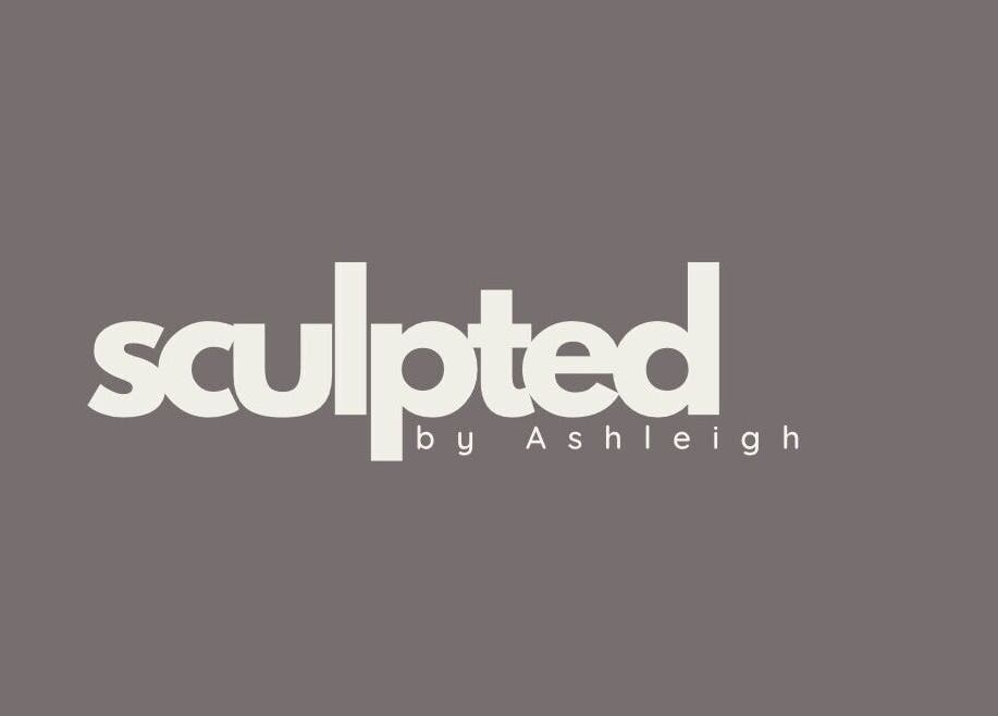 Sculpted by Ashleigh logo on a grey background, representing the beauty venue in Moreton, England, GB.