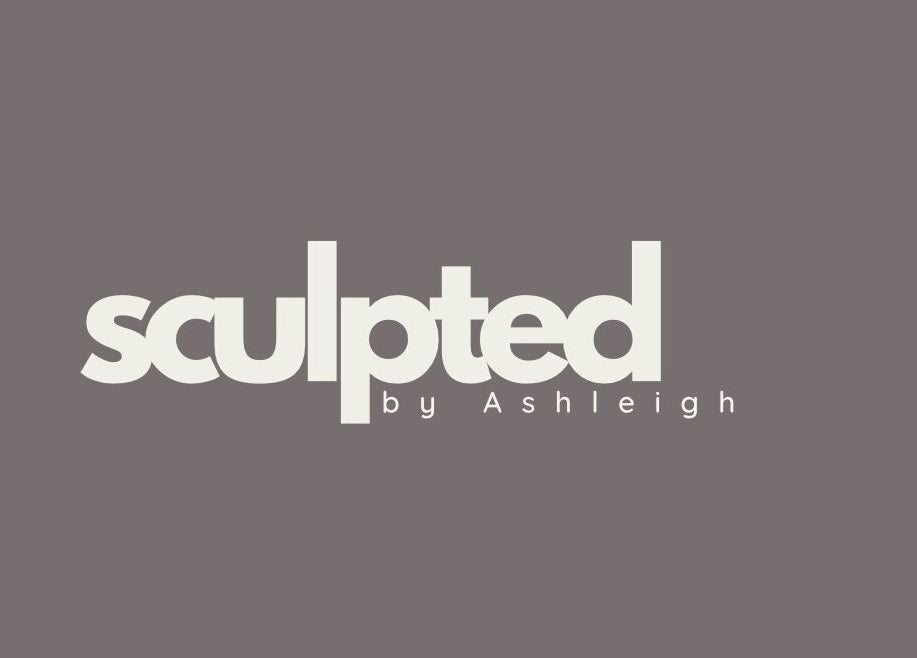 Sculpted by Ashleigh logo on a grey background, representing the beauty venue in Moreton, England, GB.